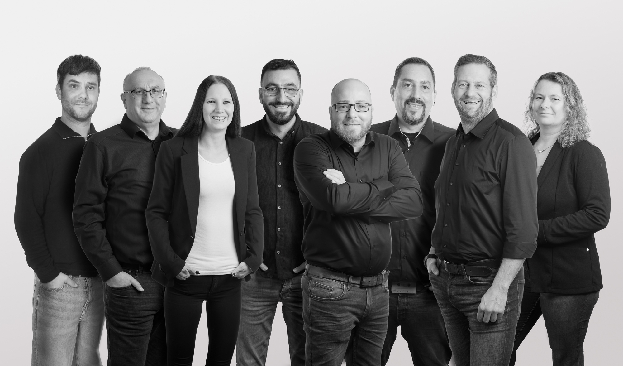 Gruppenfoto des achtköpfigen ASKremer-Teams aus Ennigerloh